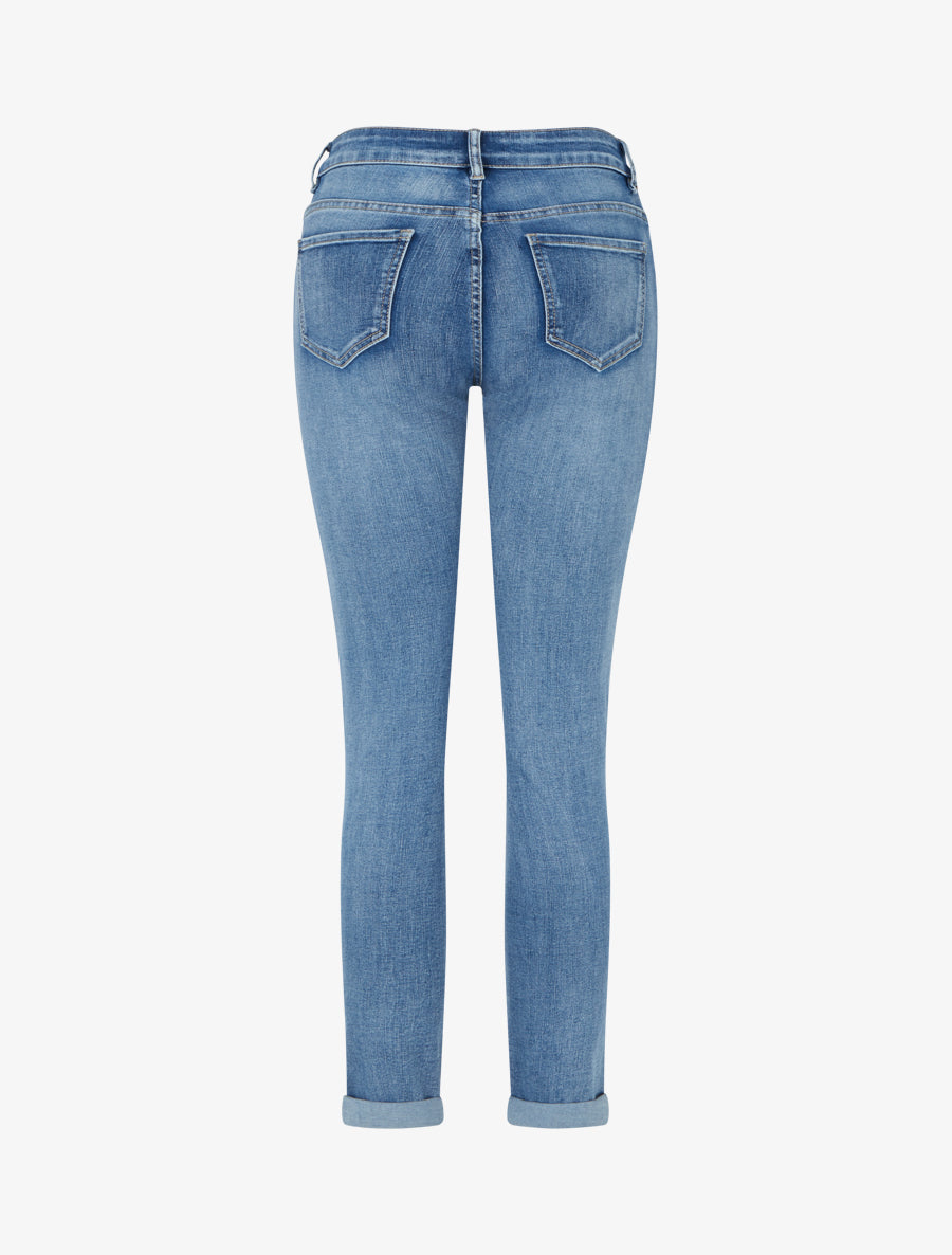 Skinny-Jeans mit Schmucksäumen und Gürtel - Blau