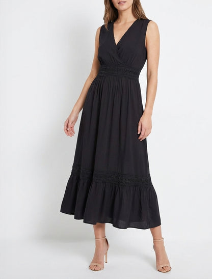 Ärmelloses Kleid mit Stickereien - Schwarz
