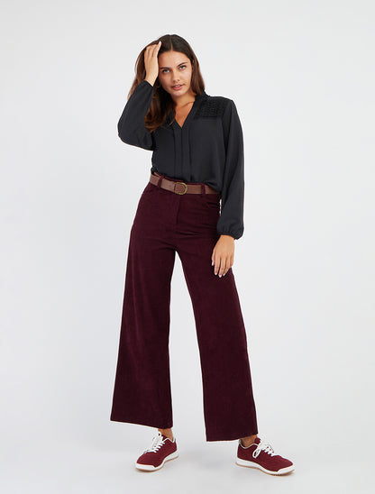 Fließende Bluse mit Ballonschnitt und Häkel-Detail - Schwarz
