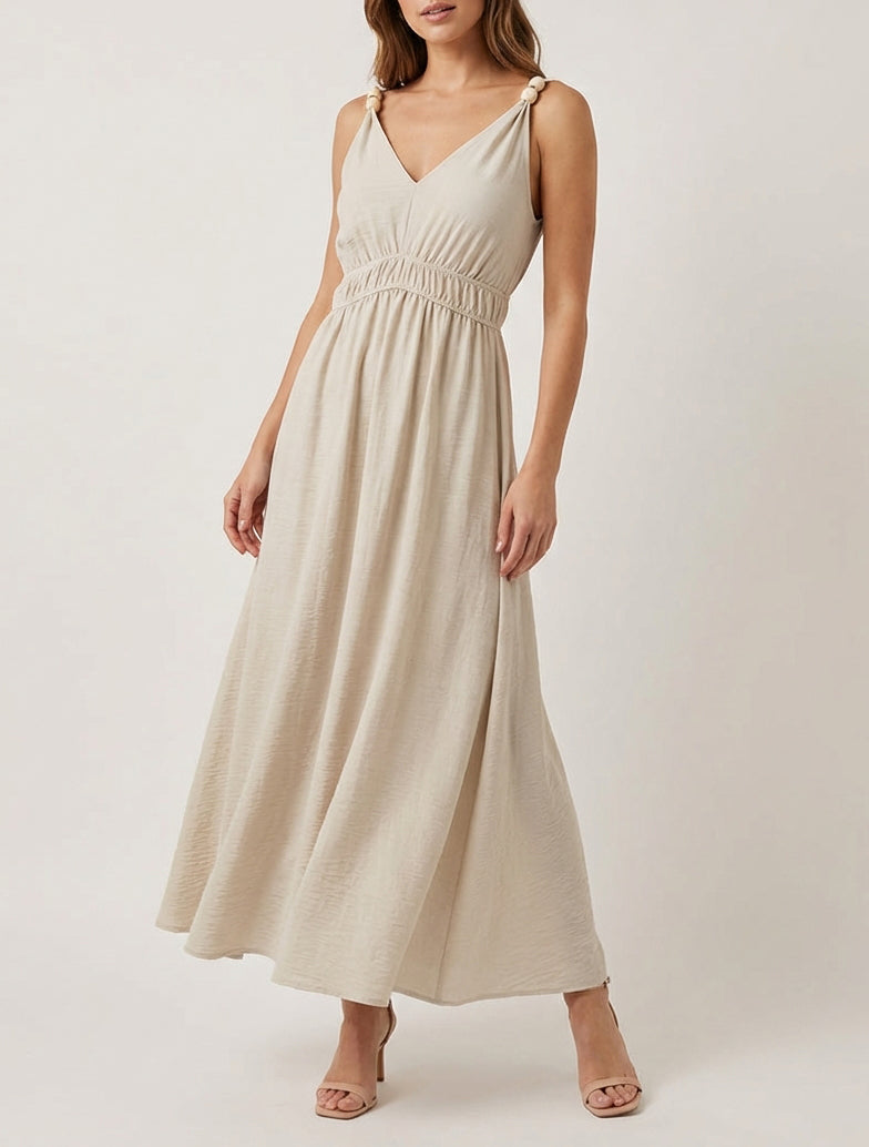 Langes ausgestelltes Kleid mit Perlenriemen - Beige