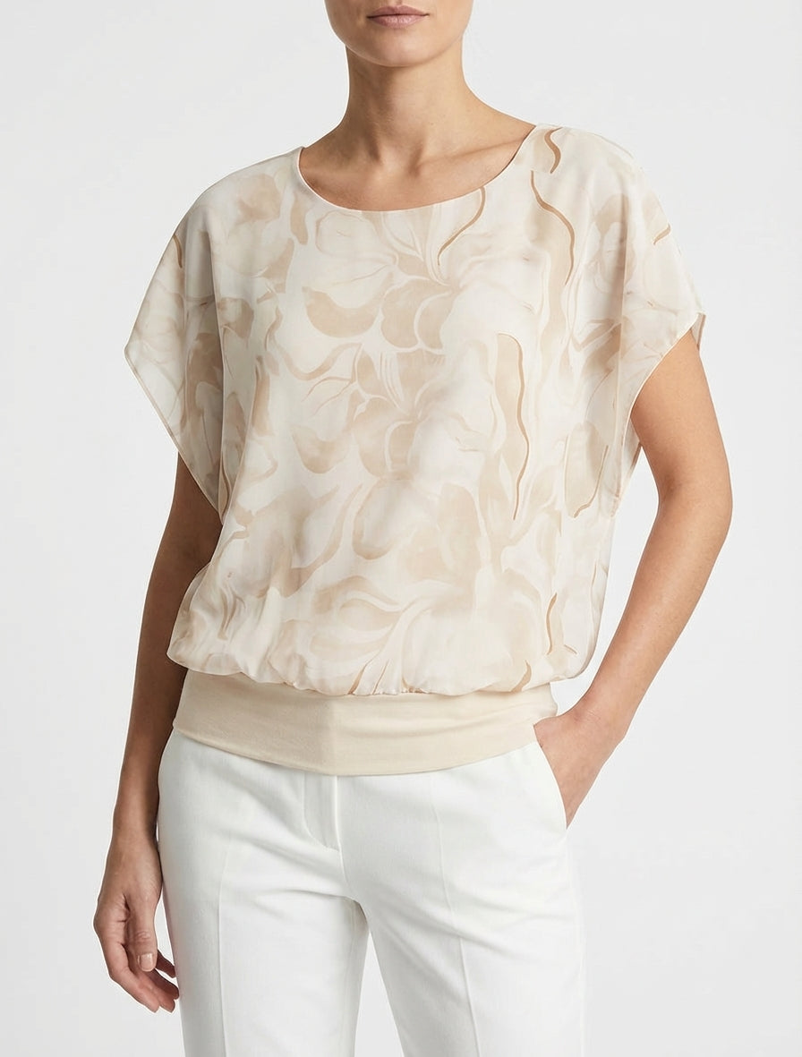 Kurzarm-Top mit Blumenmuster oben rechts. - Beige