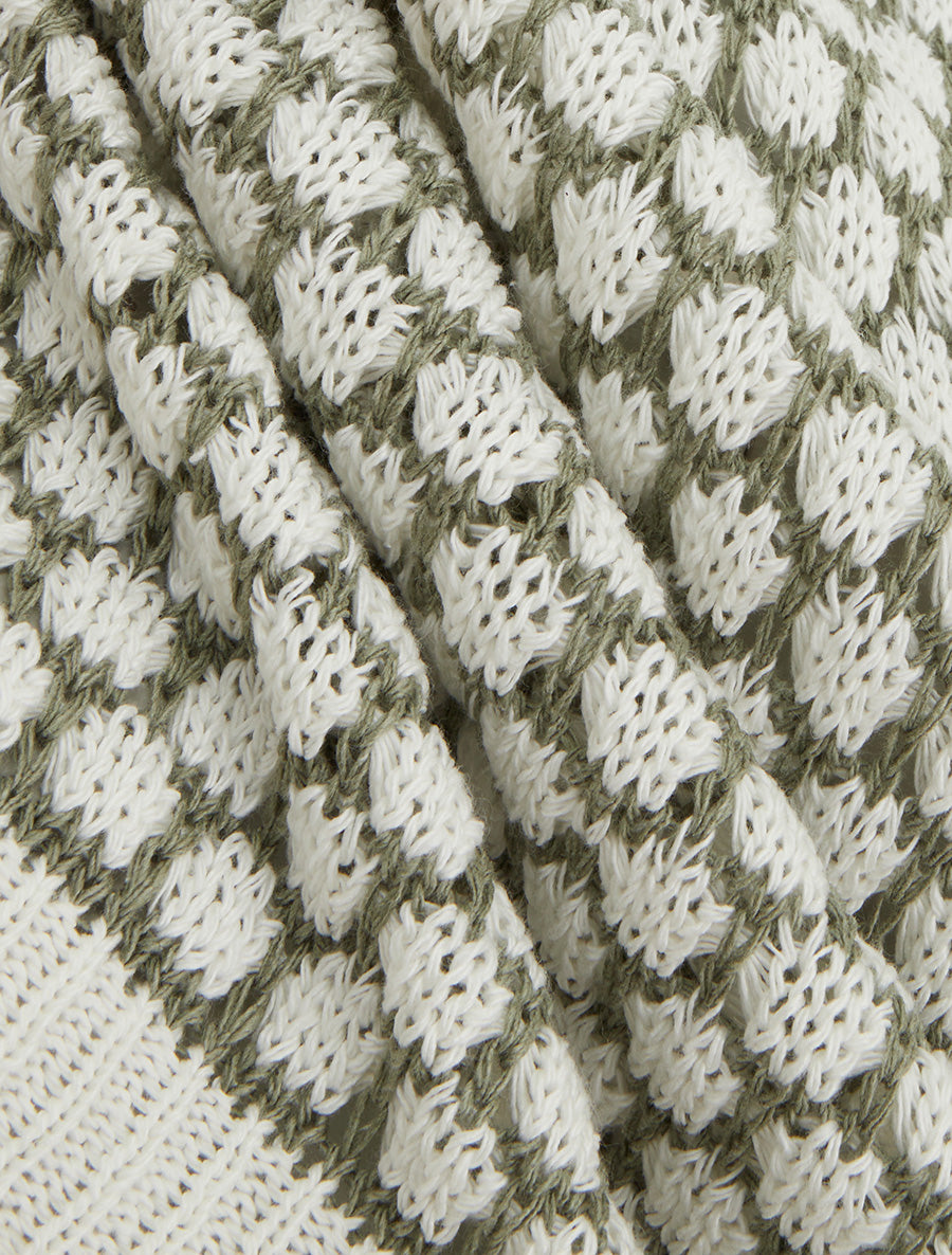 Pull sans manches motif nid d&